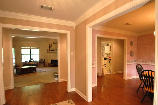 4707 Glen Valley Dr, Little Rock, AR 72223 - hall featuring crown molding and dark wood-type flooring