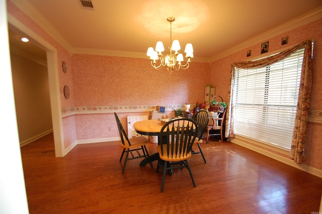 4707 Glen Valley Dr, Little Rock, AR 72223 - dining area with wallpapered walls, a chandelier, wood finished floors, and crown molding