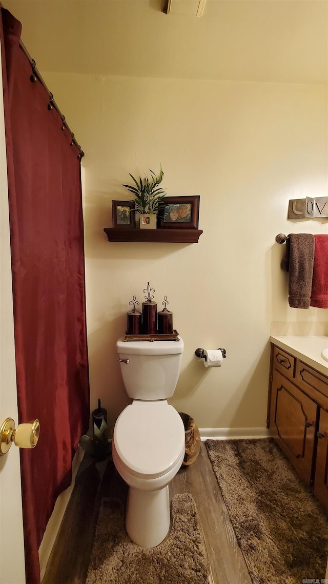 81 Pheasant Run Dr, Cabot, AR 72023 - full bathroom with vanity, a shower with shower curtain, and wood finished floors