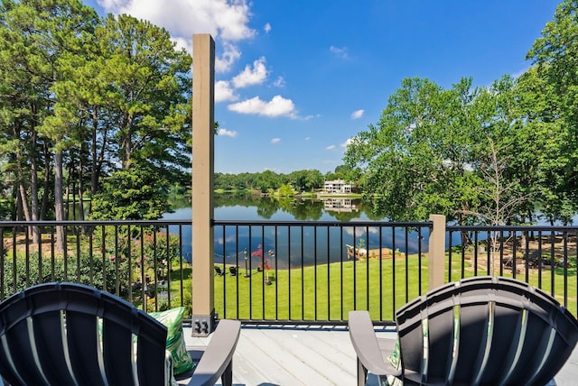3605 N Hills Blvd, North Little Rock, AR 72116 - wooden terrace featuring a water view and a lawn