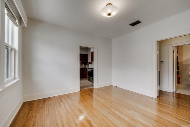 205 S Martin St, Little Rock, AR 72205 - empty room with light wood-type flooring and baseboards