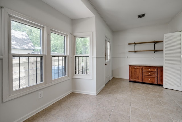 205 S Martin St, Little Rock, AR 72205 - interior space with light tile patterned floors and baseboards