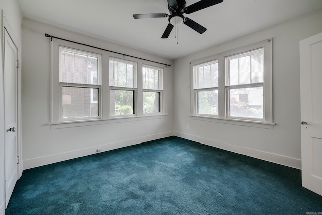 205 S Martin St, Little Rock, AR 72205 - spare room with dark carpet and ceiling fan