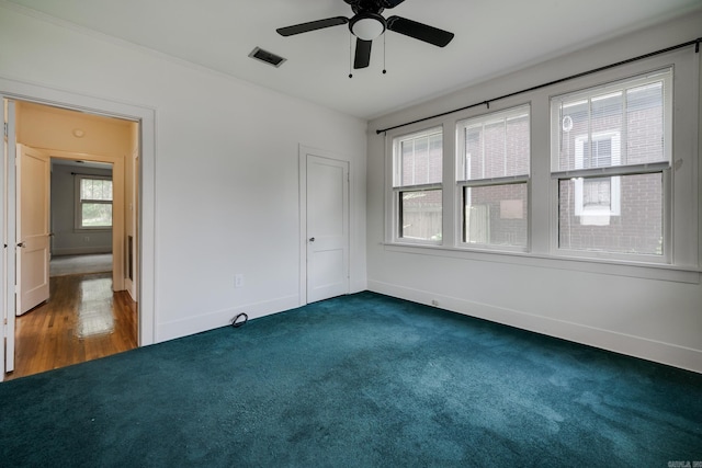 205 S Martin St, Little Rock, AR 72205 - unfurnished bedroom featuring baseboards and ceiling fan
