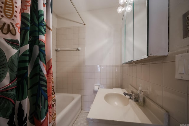 205 S Martin St, Little Rock, AR 72205 - full bathroom with vanity, shower / bathtub combination with curtain, and tile walls