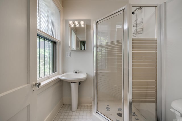 205 S Martin St, Little Rock, AR 72205 - bathroom featuring a shower stall and tile patterned floors