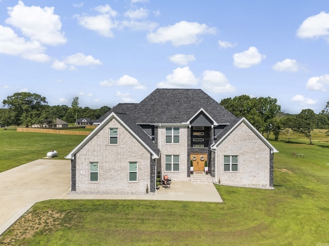148 Irene Cir, Greenbrier, AR 72058 - rear view of property with a lawn, brick siding, and a shingled roof