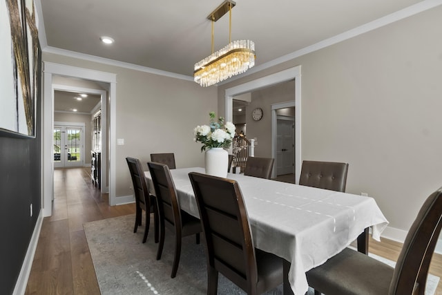 148 Irene Cir, Greenbrier, AR 72058 - dining area with a chandelier, crown molding, wood finished floors, and recessed lighting