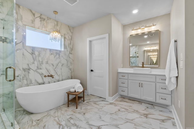 148 Irene Cir, Greenbrier, AR 72058 - bathroom with marble finish flooring, a soaking tub, vanity, a marble finish shower, and a chandelier