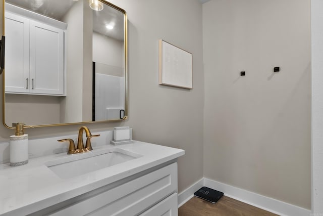 148 Irene Cir, Greenbrier, AR 72058 - bathroom with vanity and wood finished floors