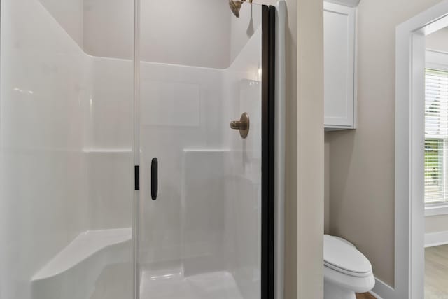 148 Irene Cir, Greenbrier, AR 72058 - bathroom with a stall shower and wood finished floors