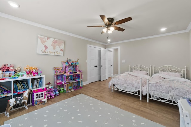 148 Irene Cir, Greenbrier, AR 72058 - bedroom with wood finished floors, crown molding, a ceiling fan, a closet, and recessed lighting