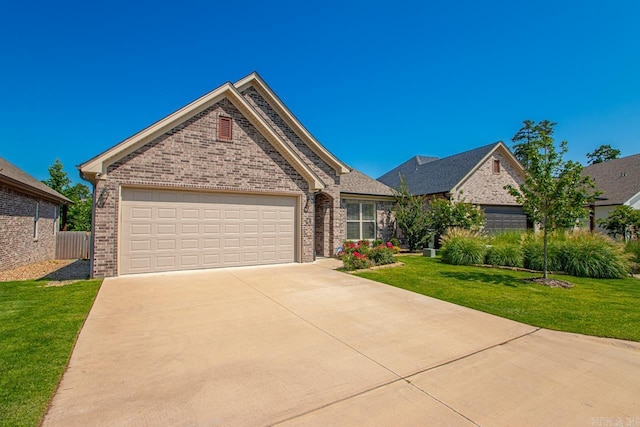49 Saffron Cir, Little Rock, AR 72223 - single story home featuring brick siding, an attached garage, a front lawn, and driveway
