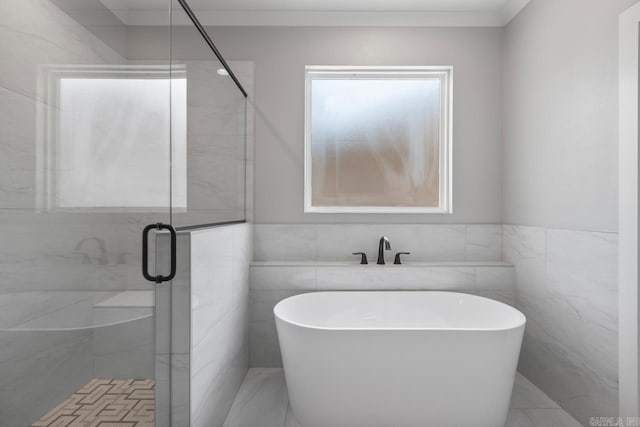 49 Saffron Cir, Little Rock, AR 72223 - full bath with a freestanding tub, a shower stall, and tile walls