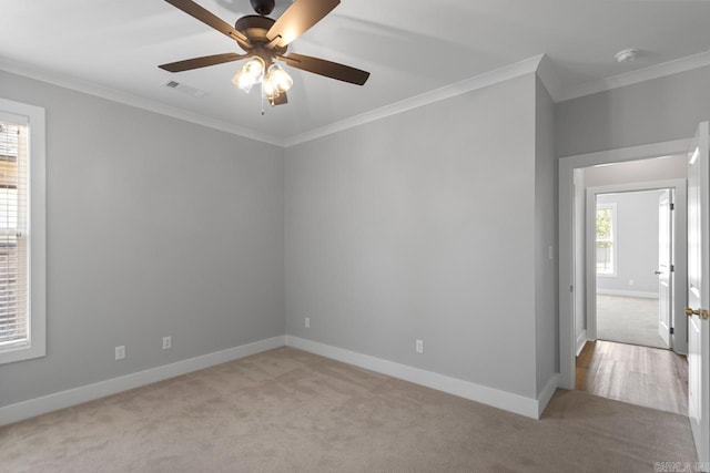 49 Saffron Cir, Little Rock, AR 72223 - spare room featuring light carpet, ornamental molding, a smoke detector, and ceiling fan