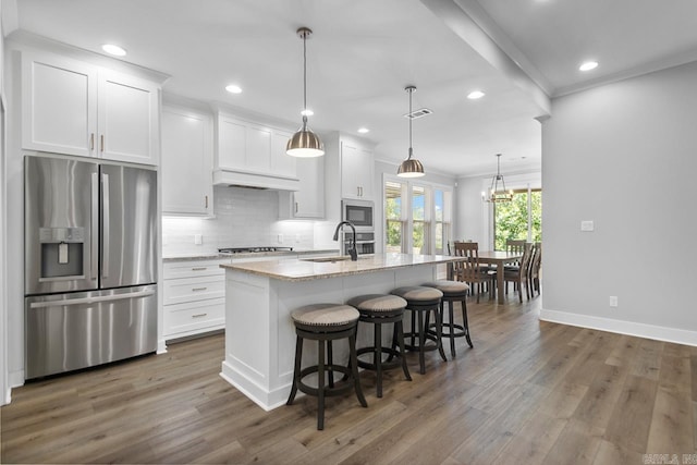 49 Saffron Cir, Little Rock, AR 72223 - kitchen featuring appliances with stainless steel finishes, wood finished floors, white cabinetry, crown molding, and recessed lighting