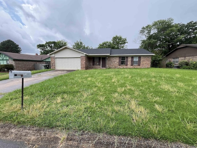 9313 Timber Valley Rd, Little Rock, AR 72204 - view of front of house featuring an attached garage, brick siding, driveway, and a front lawn