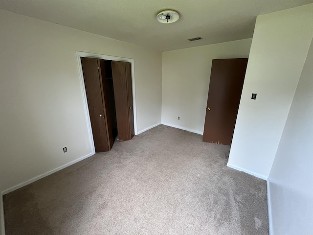 9313 Timber Valley Rd, Little Rock, AR 72204 - unfurnished bedroom featuring carpet flooring and a closet
