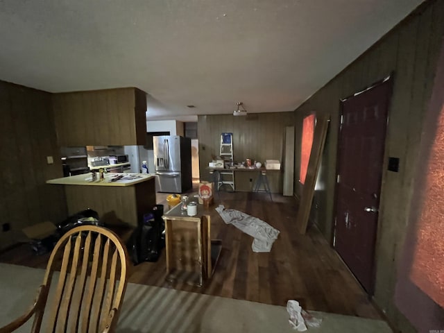 9313 Timber Valley Rd, Little Rock, AR 72204 - dining room featuring wood finished floors and wooden walls