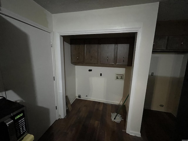 9313 Timber Valley Rd, Little Rock, AR 72204 - laundry area featuring cabinet space, dark wood-style flooring, and hookup for a washing machine