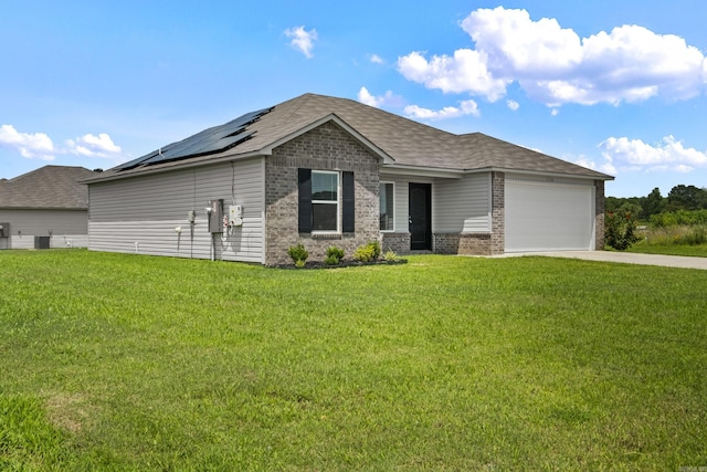 116 Baldwin Dr, Beebe, AR 72012 - view of front of house featuring brick siding, an attached garage, driveway, and a front yard
