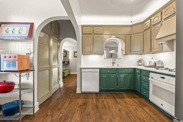 127 W F Ave, North Little Rock, AR 72116 - kitchen with white appliances, tasteful backsplash, and green cabinets