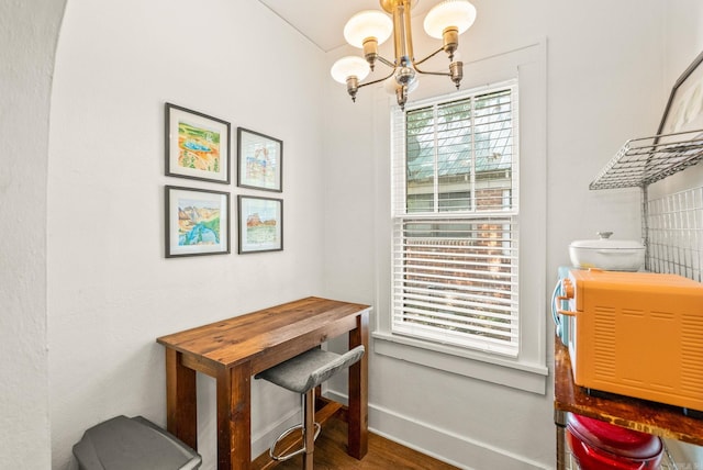 127 W F Ave, North Little Rock, AR 72116 - dining space with a chandelier and wood finished floors