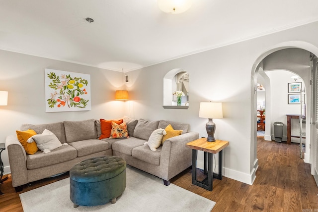 127 W F Ave, North Little Rock, AR 72116 - living area featuring arched walkways, ornamental molding, and wood finished floors