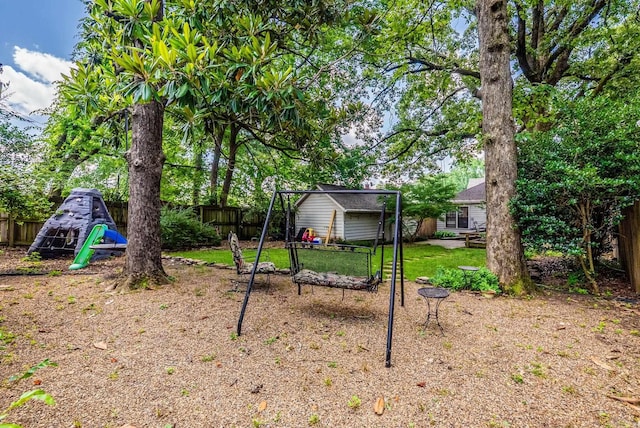 127 W F Ave, North Little Rock, AR 72116 - fenced backyard with a storage shed