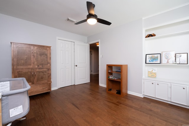 227 Valley Club Cir, Little Rock, AR 72212 - bedroom featuring dark wood-style flooring, a closet, and a ceiling fan