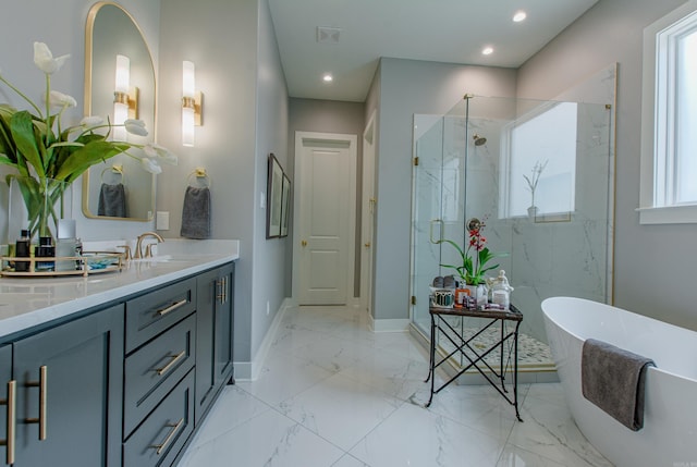 101 Mergeron Ct, Little Rock, AR 72212 - bathroom with a marble finish shower, vanity, a freestanding tub, recessed lighting, and marble finish flooring