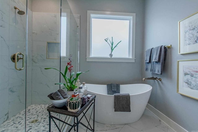 101 Mergeron Ct, Little Rock, AR 72212 - bathroom featuring marble look tiles, a marble finish shower, and a soaking tub