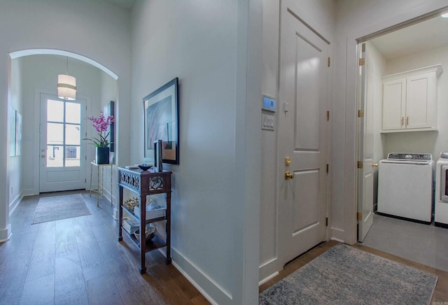 101 Mergeron Ct, Little Rock, AR 72212 - foyer with independent washer and dryer, wood finished floors, and arched walkways