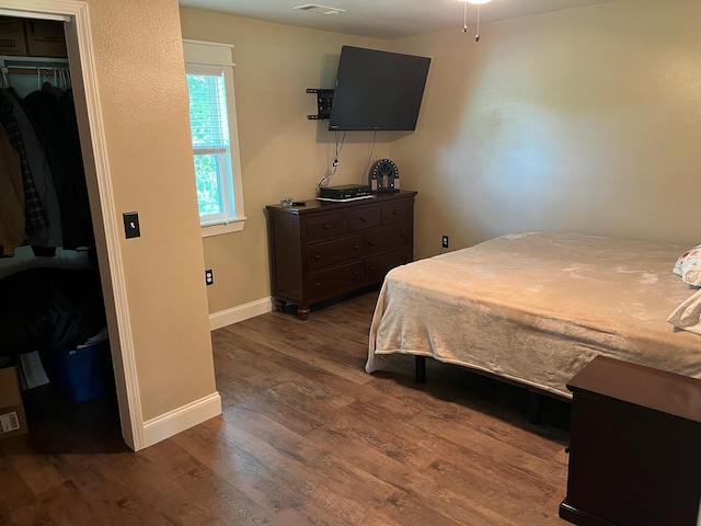 758 Barren Fork Rd, Mount Pleasant, AR 72561 - bedroom featuring baseboards and wood finished floors