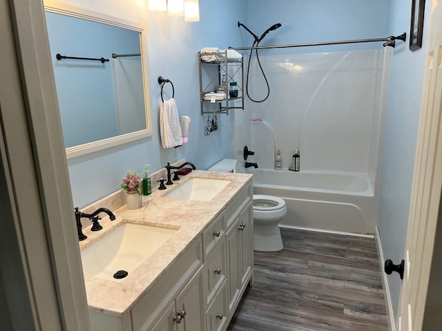 758 Barren Fork Rd, Mount Pleasant, AR 72561 - full bathroom featuring washtub / shower combination, double vanity, and wood finished floors