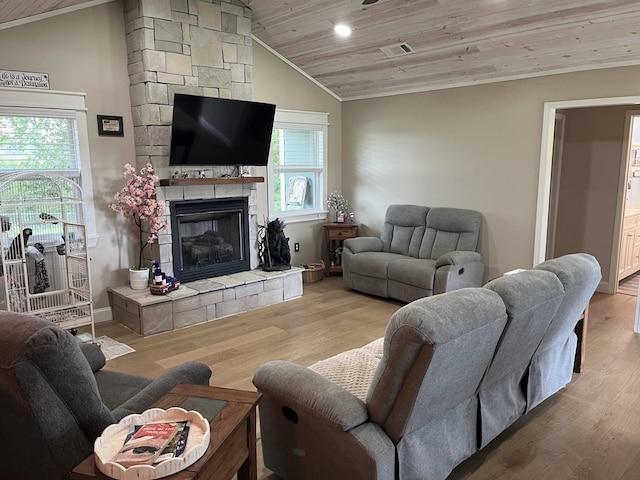 758 Barren Fork Rd, Mount Pleasant, AR 72561 - living room featuring vaulted ceiling, wood ceiling, crown molding, wood finished floors, and a fireplace