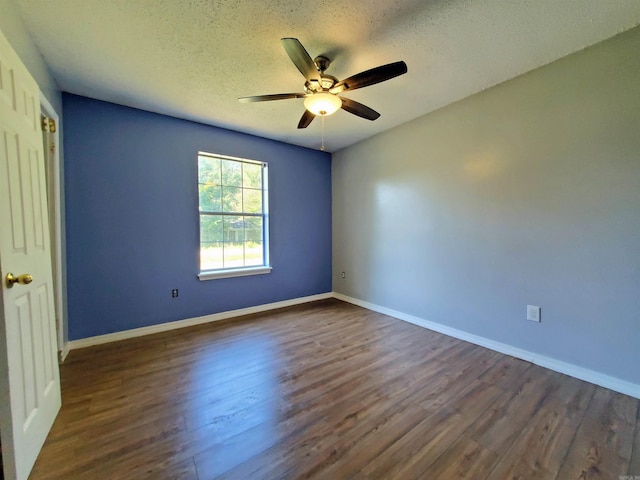 18 Langford St, Ward, AR 72176 - empty room with a ceiling fan, dark wood-style flooring, and a textured ceiling