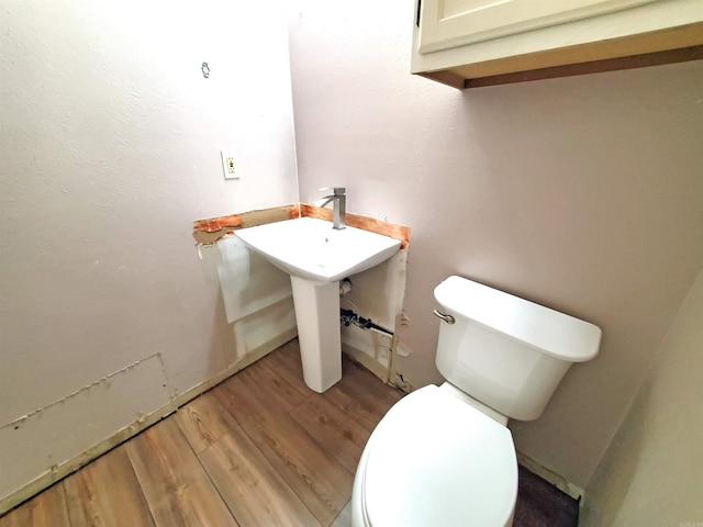 18 Langford St, Ward, AR 72176 - bathroom featuring toilet and wood finished floors