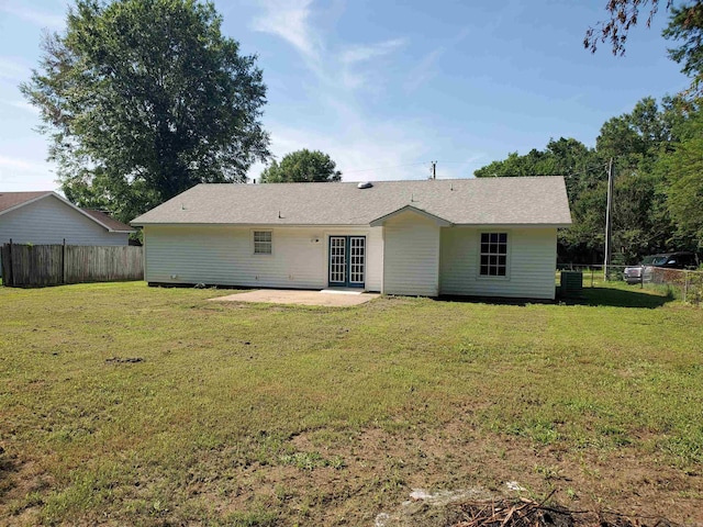 18 Langford St, Ward, AR 72176 - back of property with a fenced backyard, a patio area, and french doors