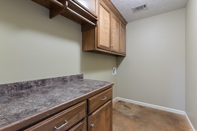 970 Wineberry, Conway, AR 72034 - laundry room featuring cabinet space, washer hookup, carpet floors, and a textured ceiling