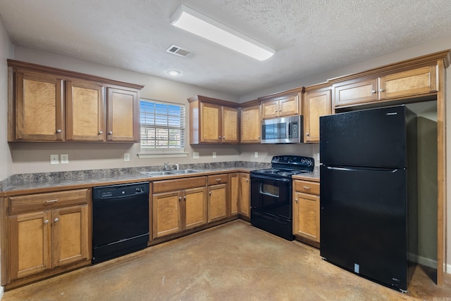 970 Wineberry, Conway, AR 72034 - kitchen with black appliances, finished concrete flooring, brown cabinets, dark countertops, and a textured ceiling
