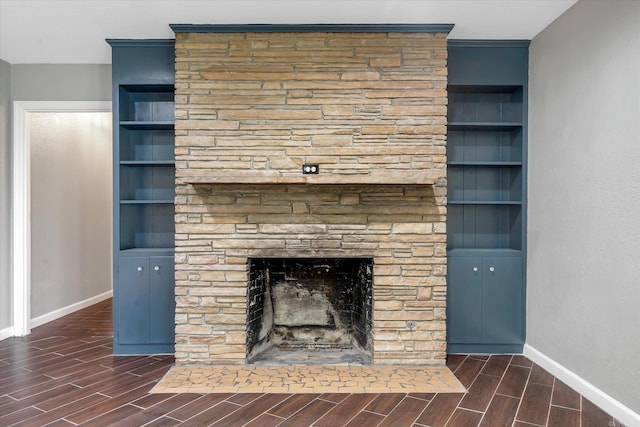 900 Melton Dr, Jonesboro, AR 72401 - detailed view of wood finish floors, a stone fireplace, and built in shelves