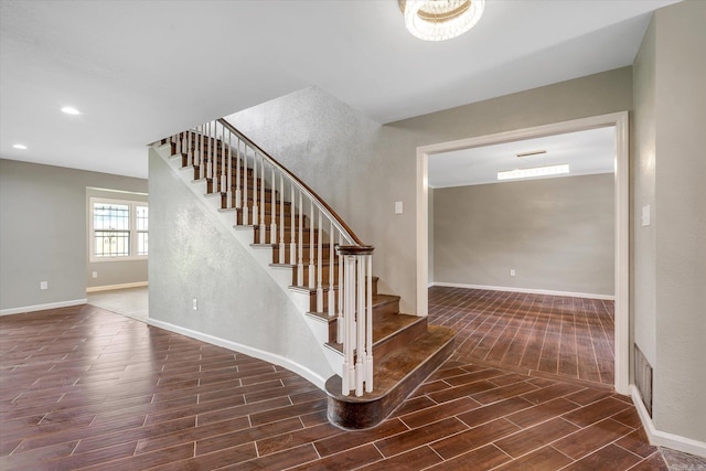 900 Melton Dr, Jonesboro, AR 72401 - stairway with wood finished floors and recessed lighting