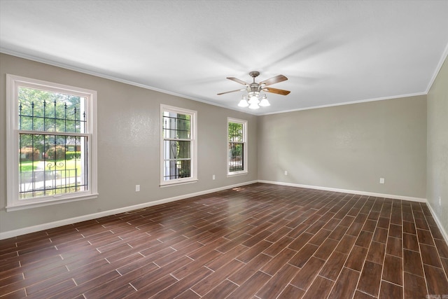 900 Melton Dr, Jonesboro, AR 72401 - spare room featuring crown molding, a ceiling fan, and dark wood-type flooring