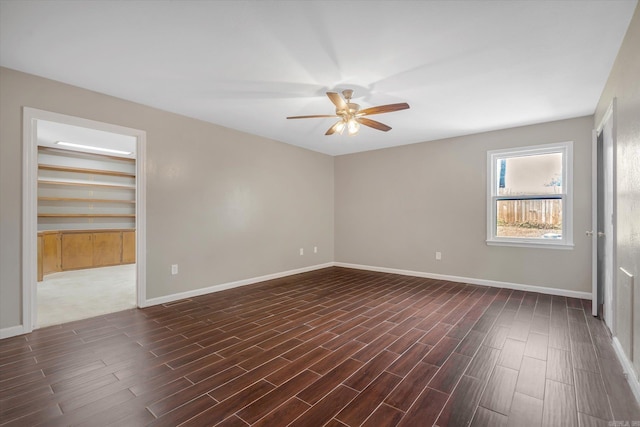 900 Melton Dr, Jonesboro, AR 72401 - unfurnished room with a ceiling fan and dark wood finished floors