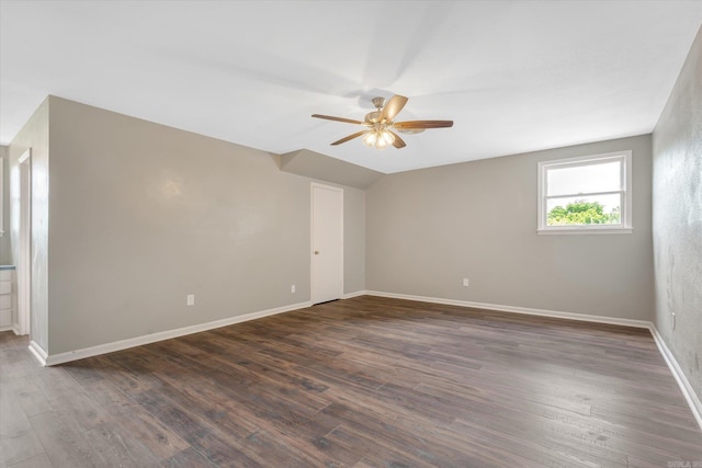 900 Melton Dr, Jonesboro, AR 72401 - unfurnished room featuring a ceiling fan, dark wood-type flooring, and lofted ceiling