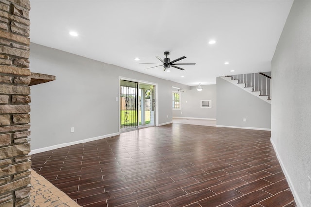 900 Melton Dr, Jonesboro, AR 72401 - unfurnished living room featuring ceiling fan, dark wood-type flooring, stairs, and recessed lighting