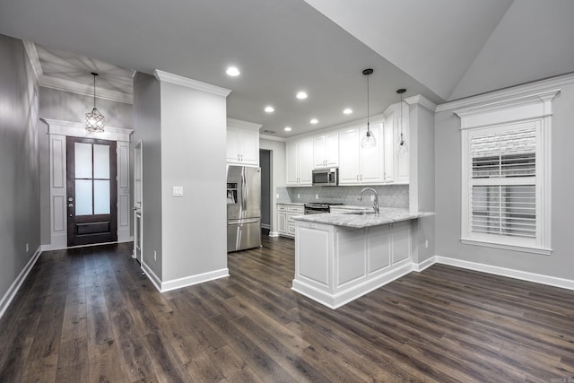 21 Piper Ln, Little Rock, AR 72223 - kitchen with appliances with stainless steel finishes, a peninsula, dark wood-style flooring, recessed lighting, and white cabinets
