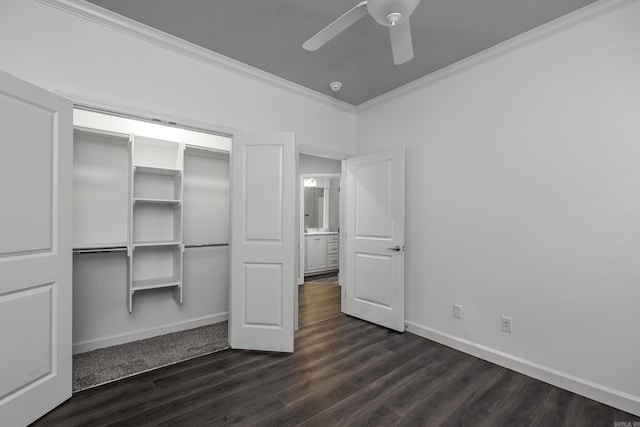 21 Piper Ln, Little Rock, AR 72223 - unfurnished bedroom featuring ornamental molding, dark wood-style floors, a ceiling fan, and a closet