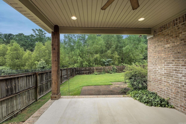 21 Piper Ln, Little Rock, AR 72223 - fenced backyard featuring a patio and a ceiling fan